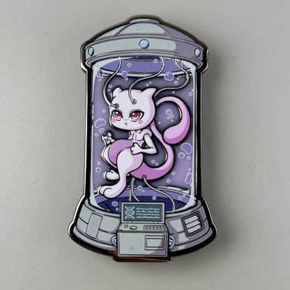 Enamel pin with a Mewtwo character in a glass jar on a gray background