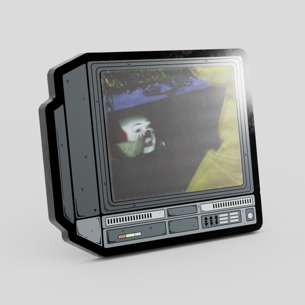 Vintage-style computer monitor with a person sitting in front of it on a light gray background Lenticular IT clown steven King Sewer Movie Pin