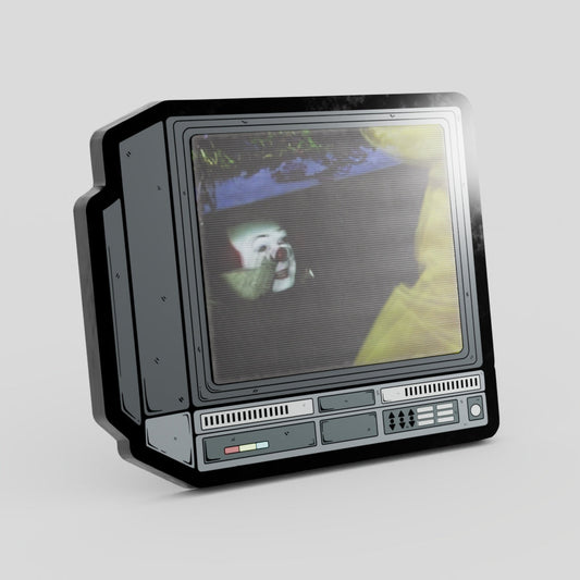 Vintage-style computer monitor with a person sitting in front of it on a light gray background Lenticular IT clown steven King Sewer Movie Pin