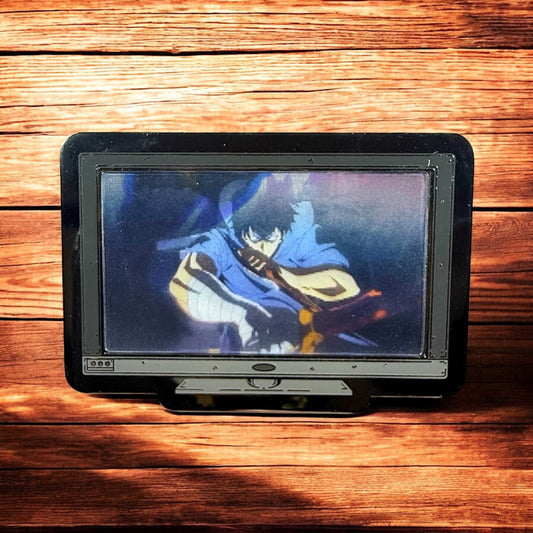 Small screen displaying an animated character on a wooden surface