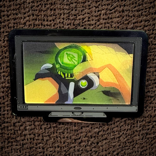 Small screen displaying a colorful graphic on a textured brown surface