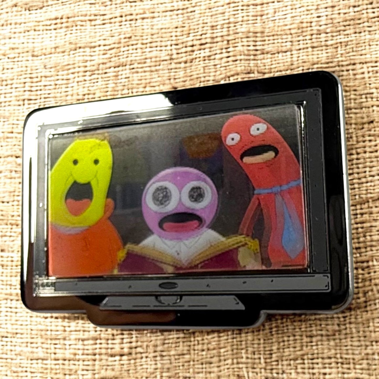 Monitor Lenticular Smiling Friends Enamel Pin