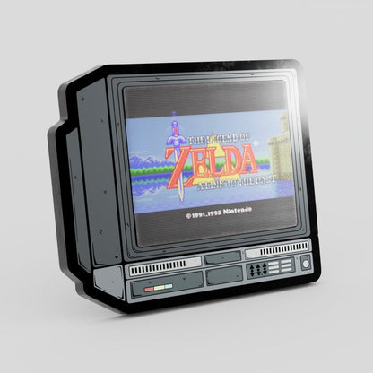 Vintage-style television set displaying 'The Legend of Zelda' game on a light gray background Zelda Link To the Past Lenticular Hard Enamel Pin