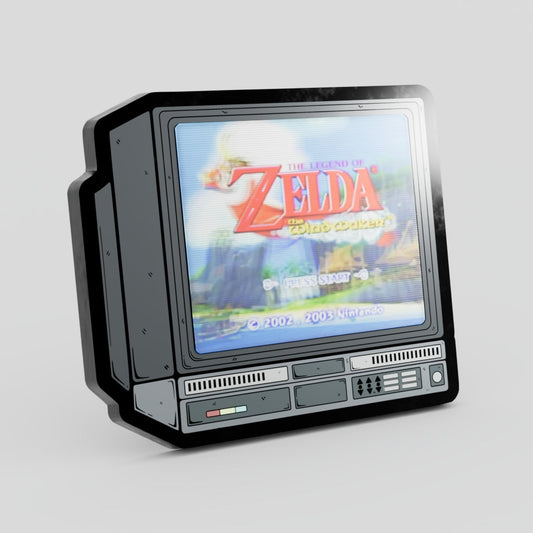 Vintage-style gaming console with 'The Legend of Zelda' game displayed on screen Zelda Lenticular Enamel Pin